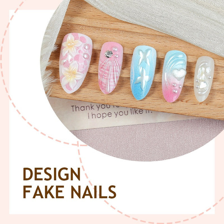 Artificial nail set with creative floral and glittering accents Stornfield