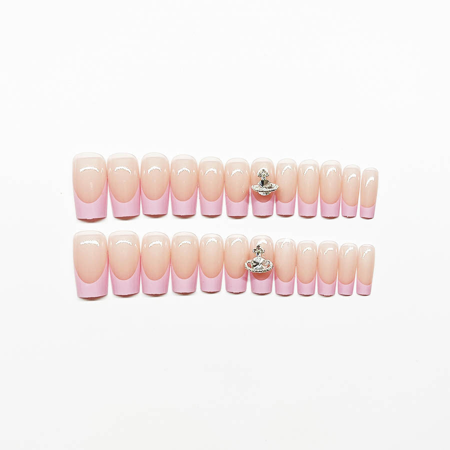 Acrylic nail set with luxurious floral and rhinestone decorations Stornfield