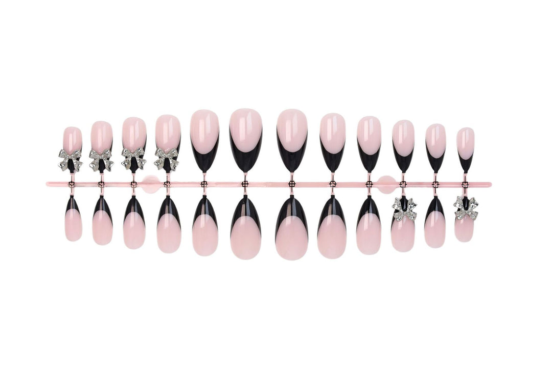 Nail art set with elegant tips and artistic embellishments Stornfield