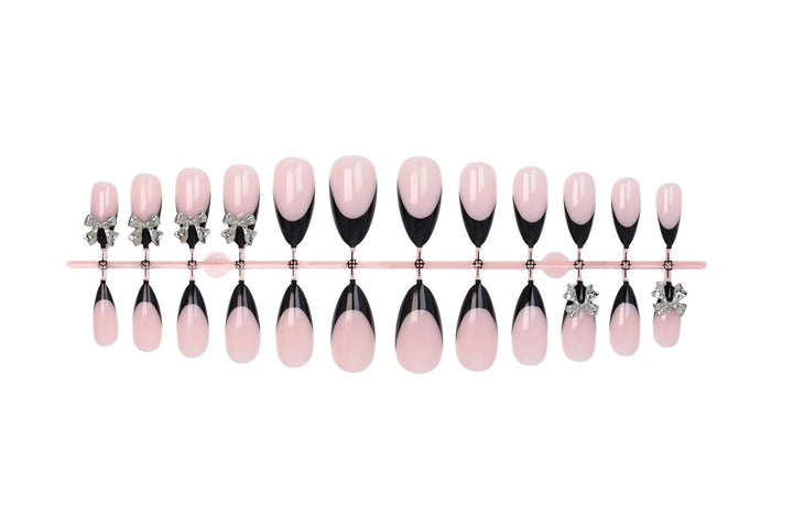 Nail art set with elegant tips and artistic embellishments Stornfield