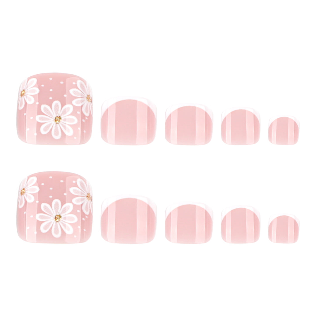 Artistic toenail art with elegant daisy motifs Stornfield