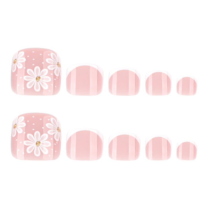 Artistic toenail art with elegant daisy motifs Stornfield