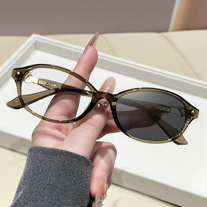 Women's fashionable optical glasses in elegant oval design with golden accents Stornfield