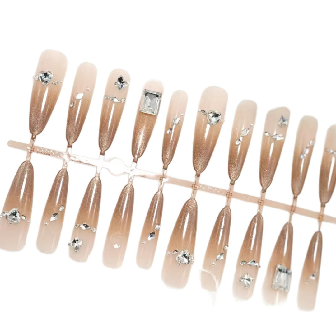 Artificial nails with sparkling rhinestone decorations Stornfield