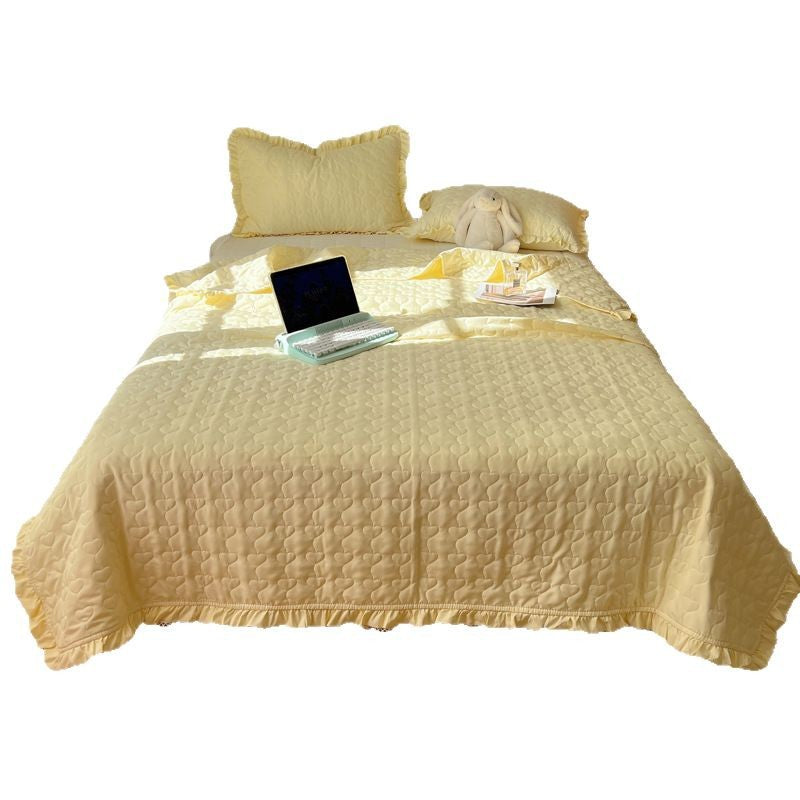 Quilted bedspread set with frill edge and heart quilting pattern