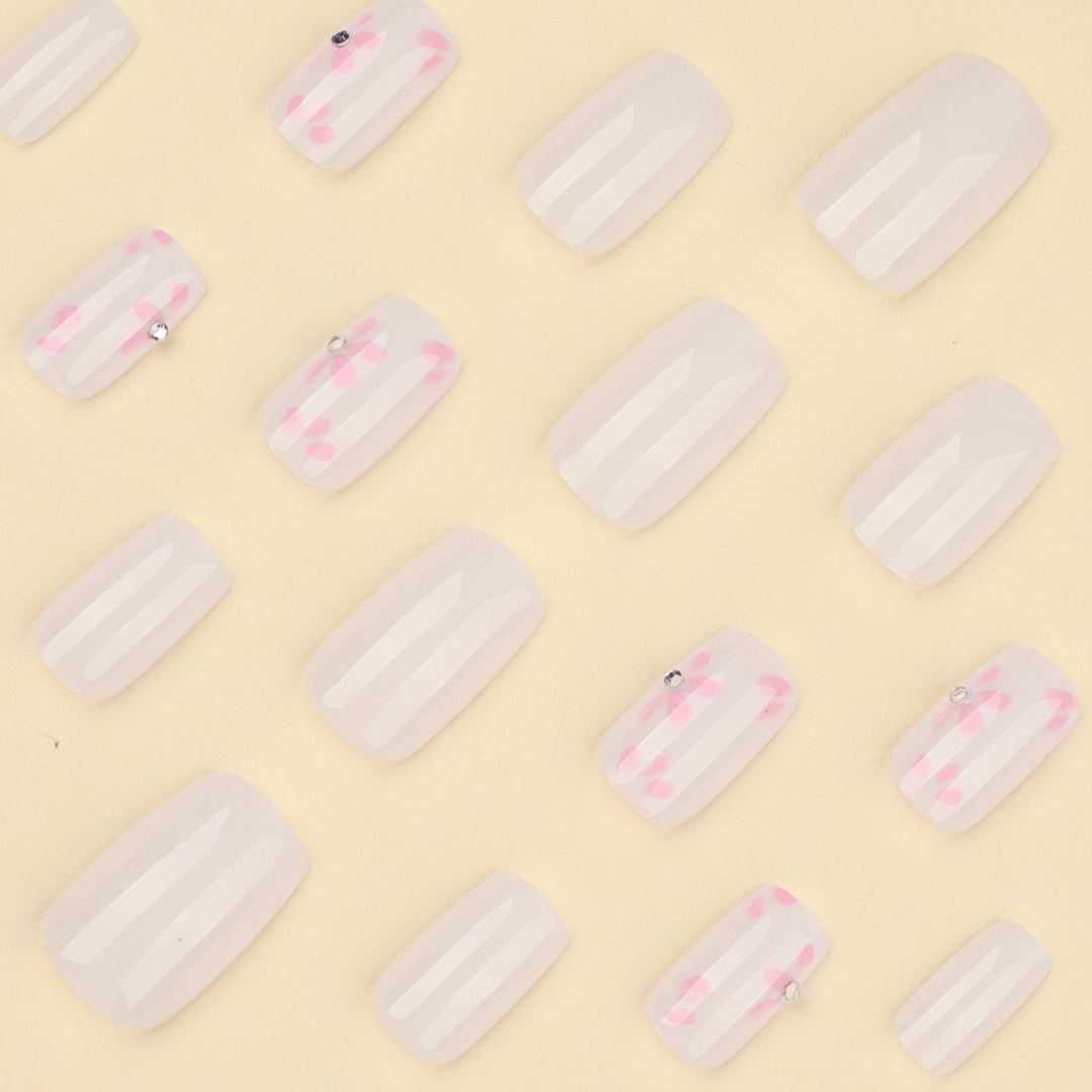 Artful Nail Art with Delicate Flower Patterns Stornfield