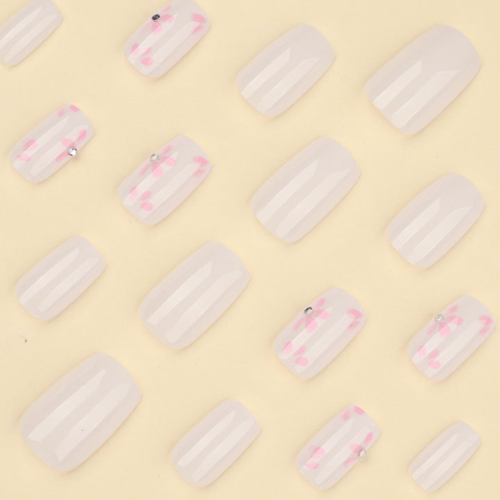 Artful Nail Art with Delicate Flower Patterns Stornfield
