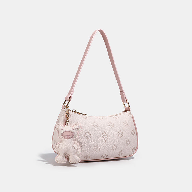 Stylish Handheld Purse with Unique Teddy Charm