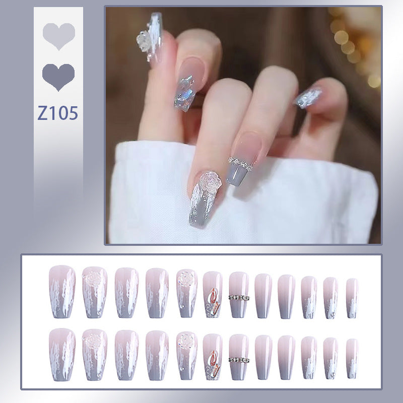 Artificial nail set with delicate rose and glitter decorations Stornfield