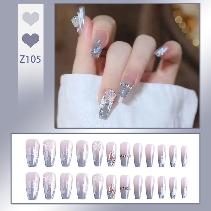 Artificial nail set with delicate rose and glitter decorations Stornfield