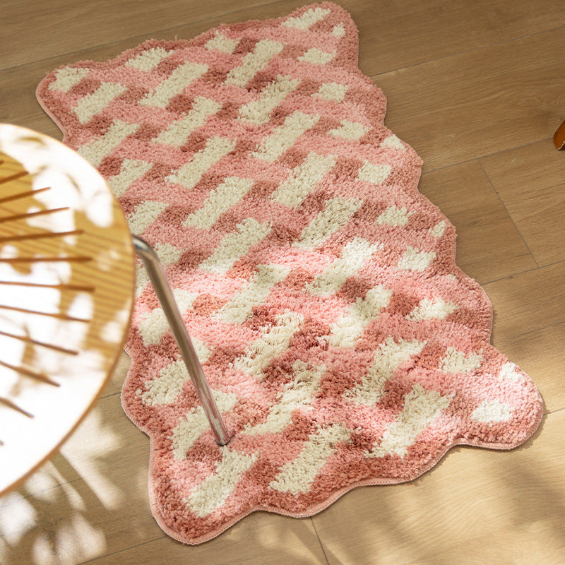 Tufted bathroom runner with wavy hem and relief-style braided pattern Stornfield