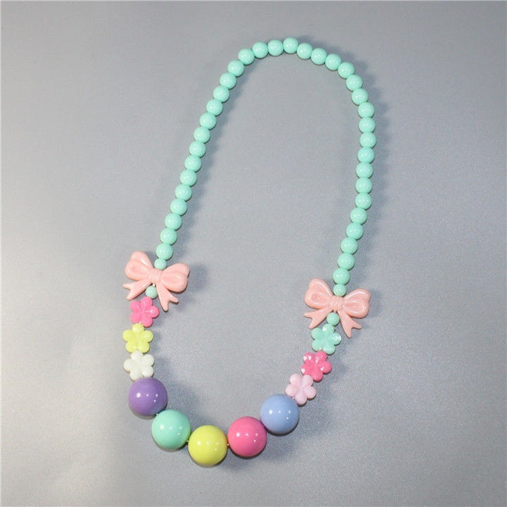 Colorful pearl necklace with floral elements Stornfield
