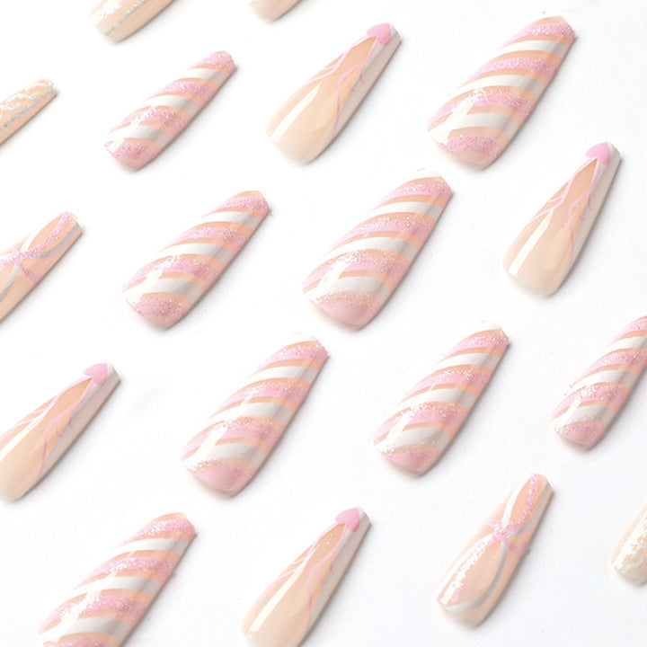 Translucent artificial nails with delicate patterns Stornfield