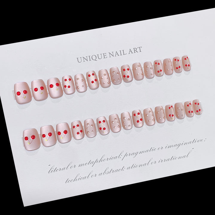 Artful nails with cherry motif Stornfield