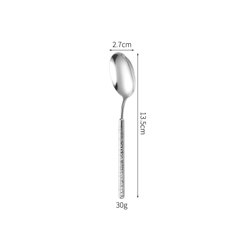Elegant dessert spoon with elaborate handle design Stornfield