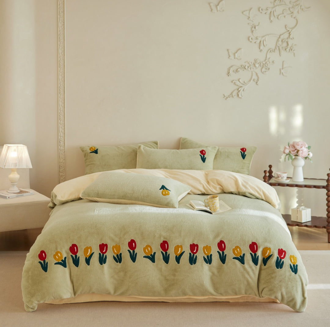 Plush duvet cover set with embroidered tulips, cozy teddy fleece, reversible function, and matching pillowcases