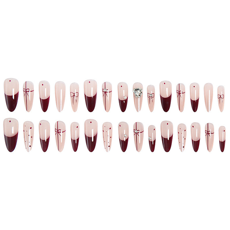Artificial nail set with elegant bow and glitter details Stornfield