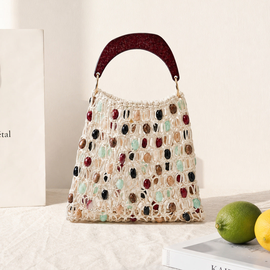 Handcrafted designer shoulder bag with unique stone accents Stornfield