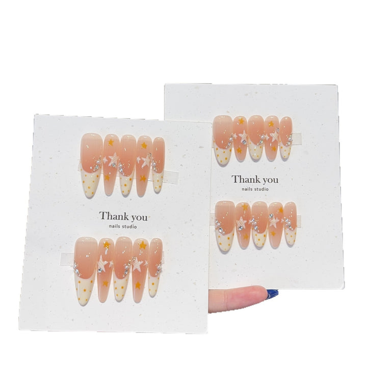 Artificial artificial nails with elegant star and glitter accents Stornfield
