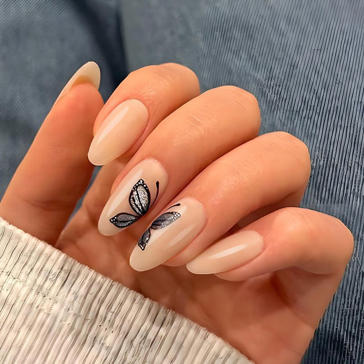 Artificial nail set with delicate butterfly motifs and elegant finish Stornfield
