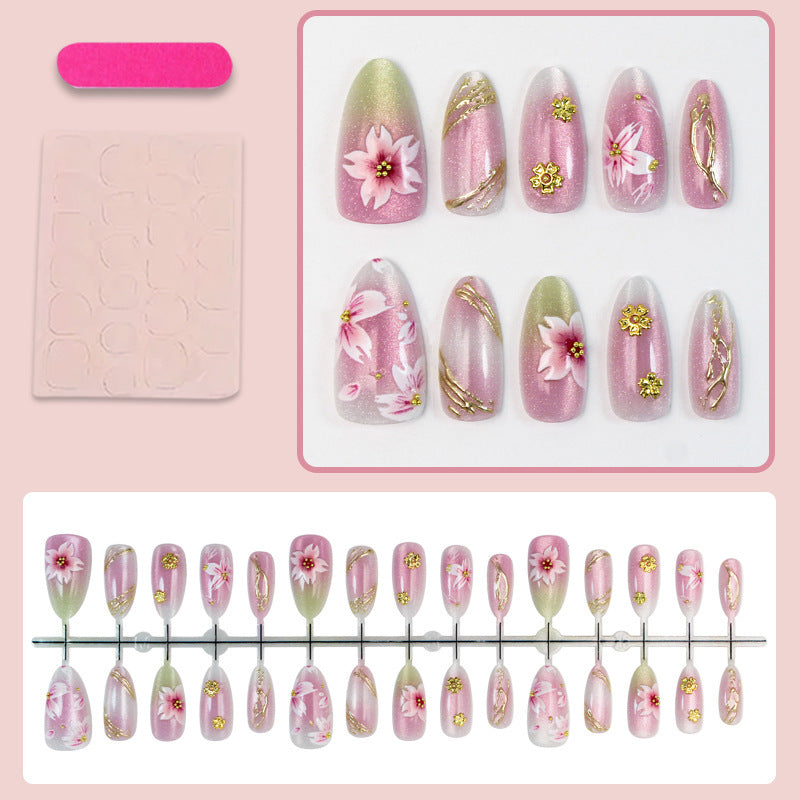 Artificial nails with floral design and gold accents Stornfield