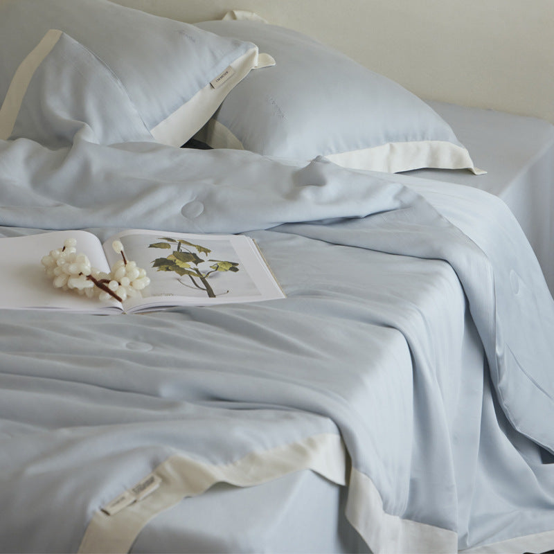 Elegant satin bedding set with silky touch, contrasting border and concealed closure