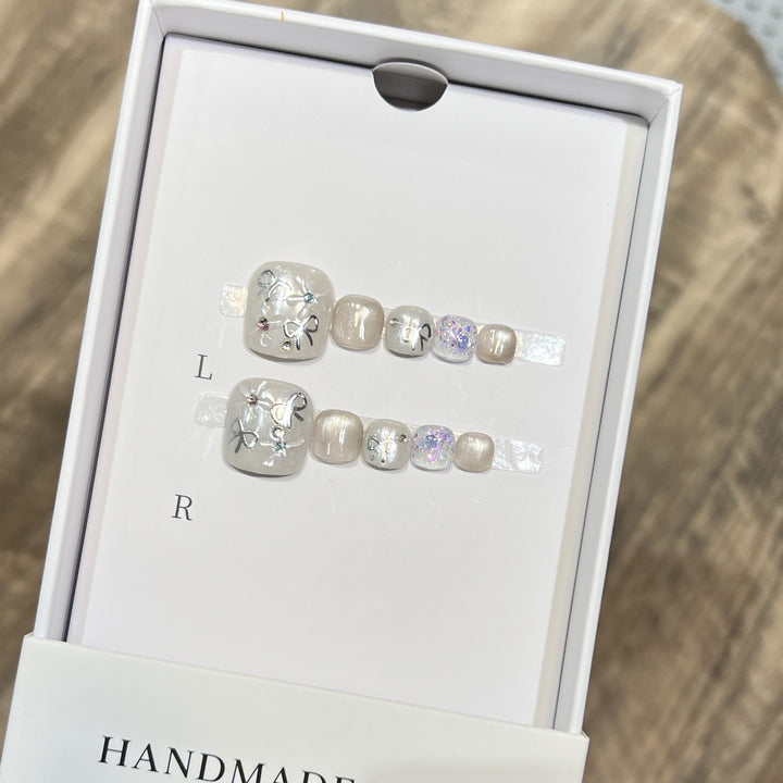 Artistic Press-On Nail Set with Glitter and Floral Design Stornfield