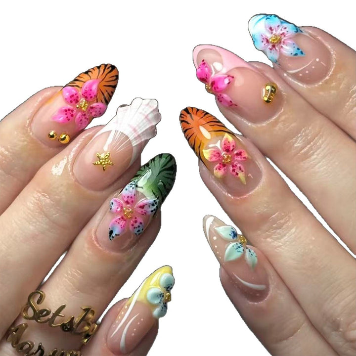 Artificial nails with creative floral and tropical designs Stornfield