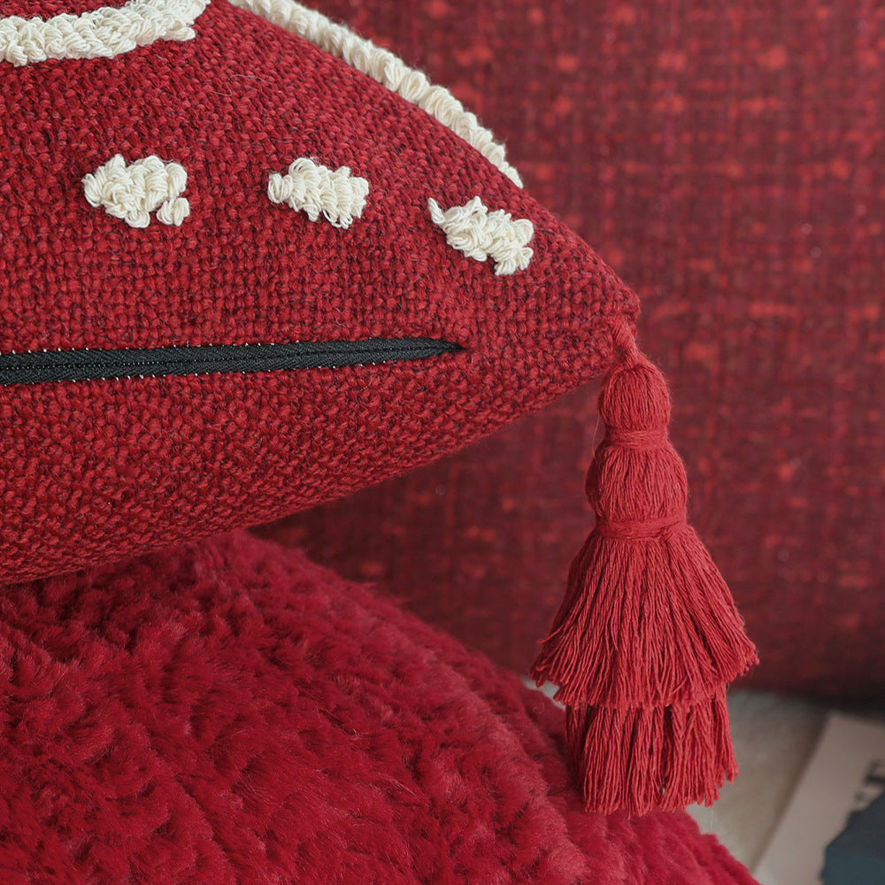 Rectangular decorative cushion with bouclé relief and tassels Stornfield