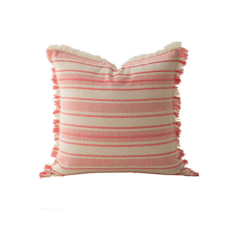 Square cushion cover made of hand-woven cotton blend with decorative fringe trim Stornfield