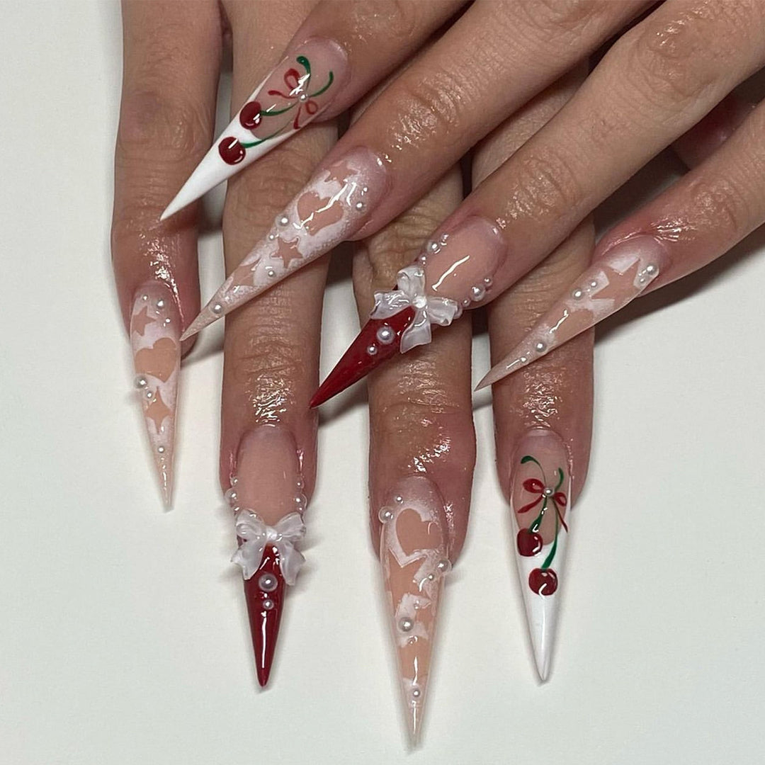 Artificial Nail Art with Festive Designs Stornfield