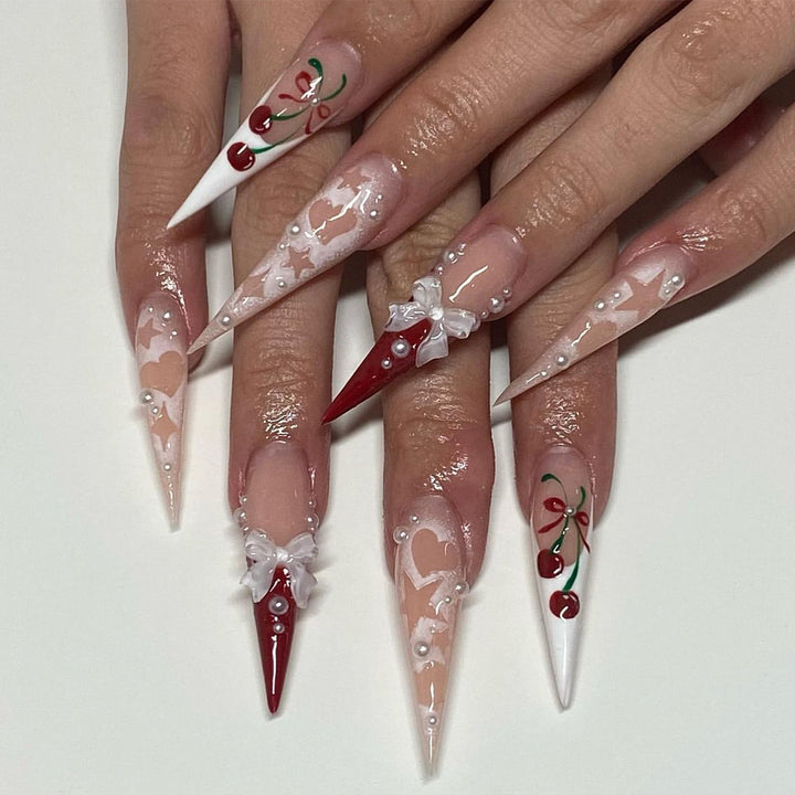 Artificial Nail Art with Festive Designs Stornfield
