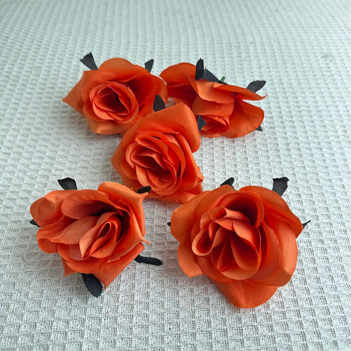 Set of delicate fabric rose hair clips for bridal and festive hairstyles