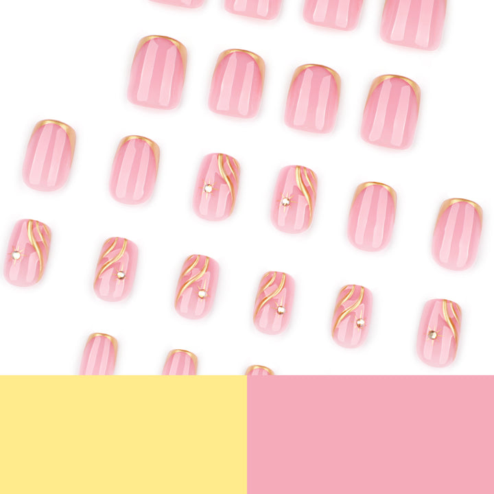 Artificial nail art with glamorous golden accents Stornfield