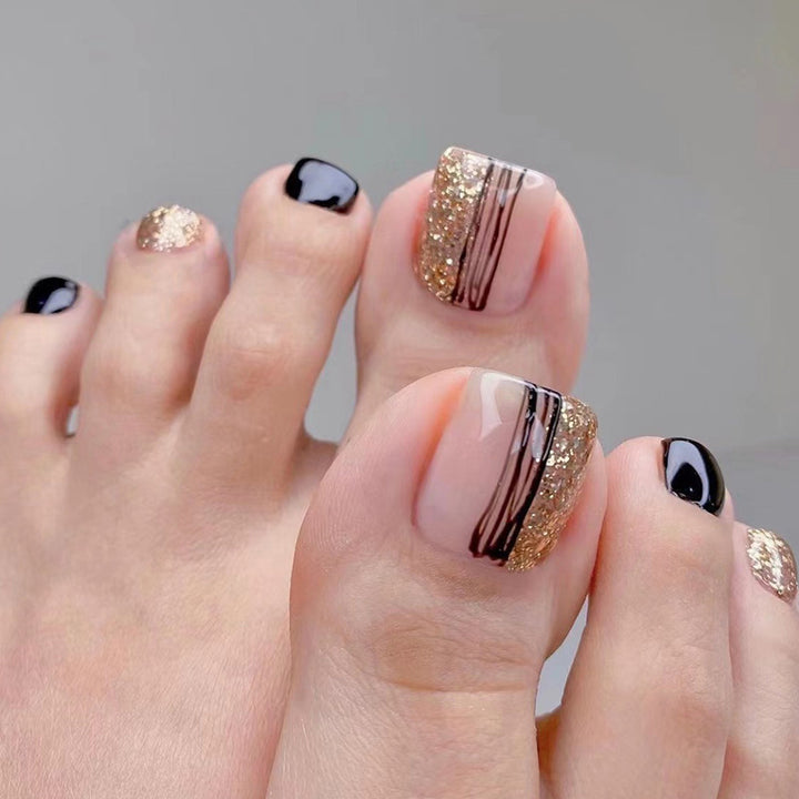 Exquisite toenail art with glitter and stripe design Stornfield