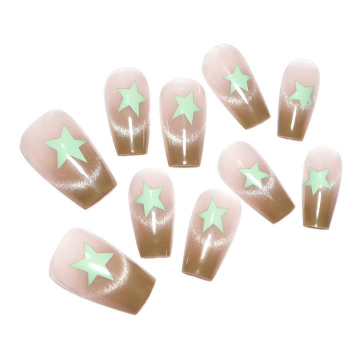 Artificial nail extensions with shimmer effect and star motifs Stornfield