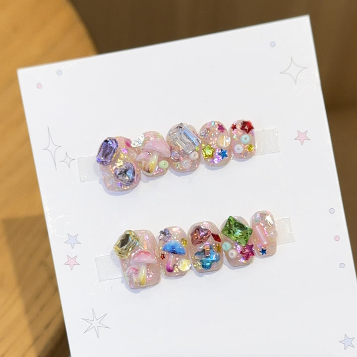 Artificial nails with sparkling crystal accents Stornfield
