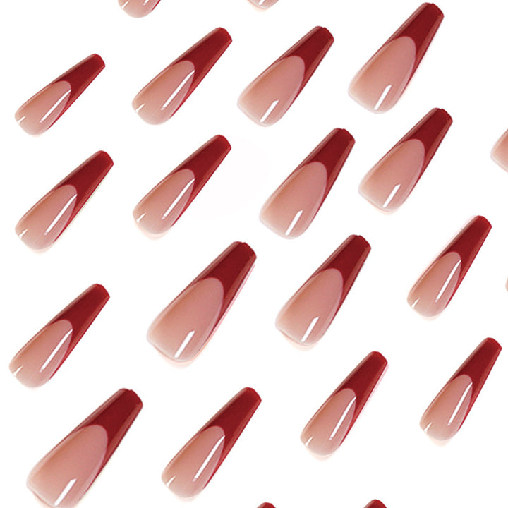 Elegant artificial nails with high-gloss finish and prominent French tip Stornfield