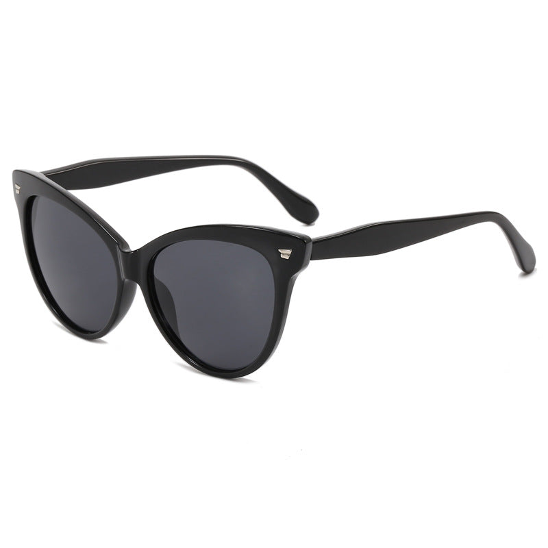 Ladies trendy cat-eye sunglasses with transparent frame and blue lenses Stornfield