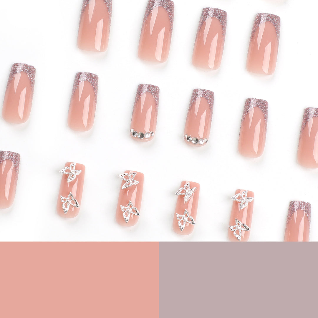 Artful Nail Extensions with Glitter and Decorative Accents Stornfield