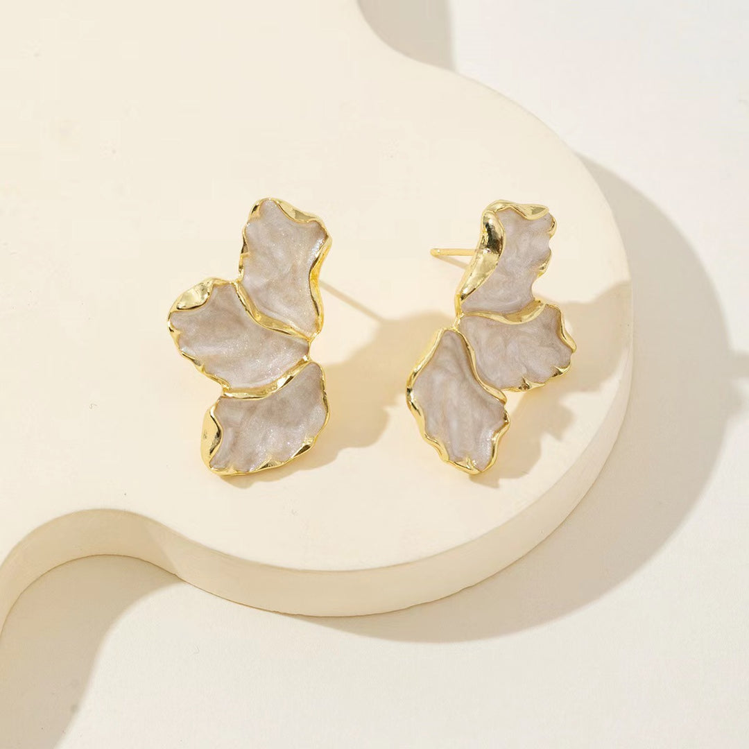 Fashionable earrings with feminine leaf design Stornfield