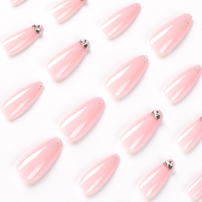 Elegant Nail Art with Glitter and Rhinestone Decorations Stornfield
