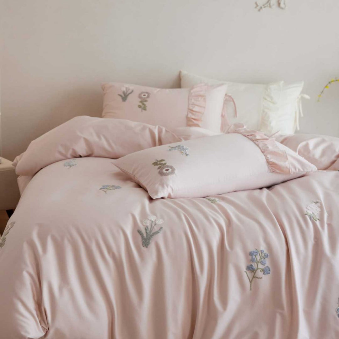 Cotton satin duvet cover set with embroidered wildflowers and decorative ruffle