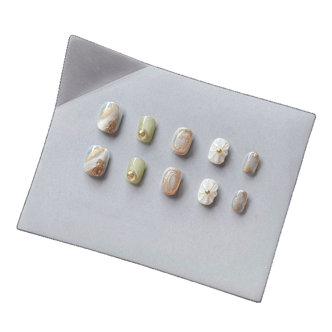 Premium Press-On Nail Art Set with Floral and Metallic Accents