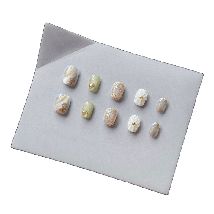 Premium Press-On Nail Art Set with Floral and Metallic Accents