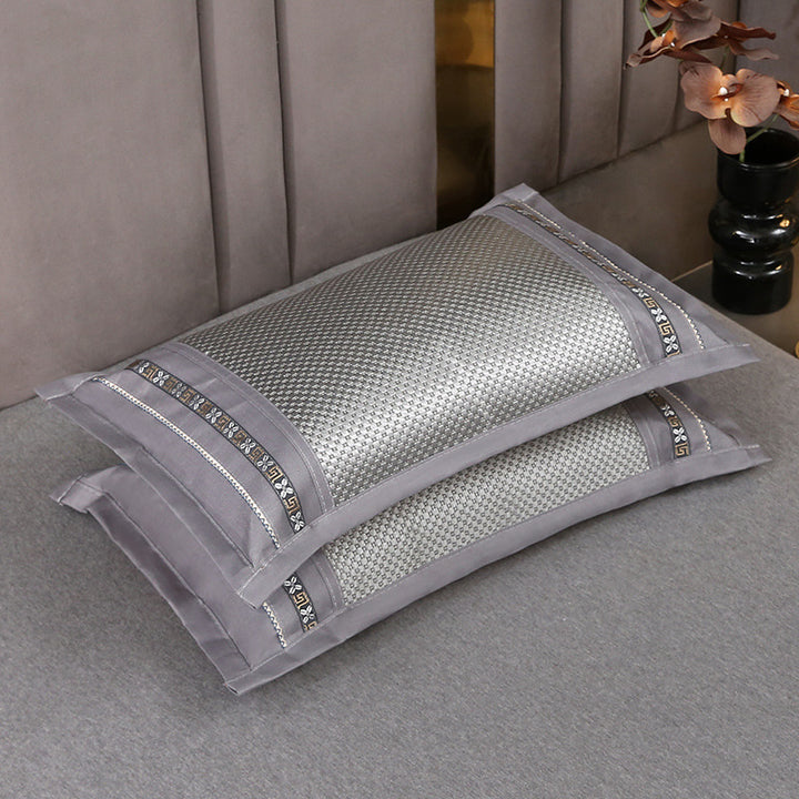 Elegant pillowcase set in jacquard look with embroidered border and satin trim