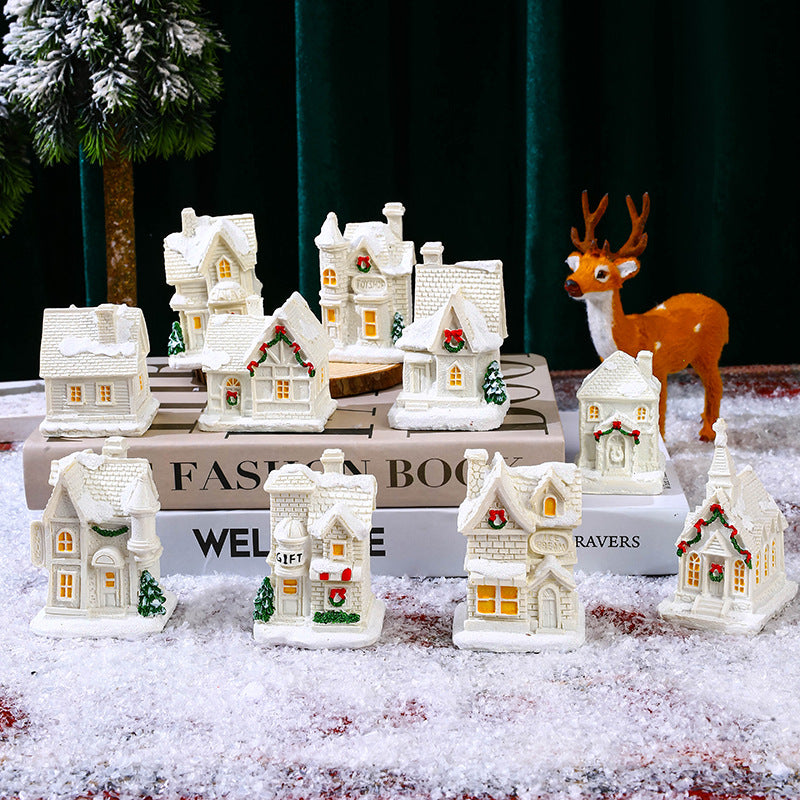 Illuminated Christmas village house with festive decoration Stornfield