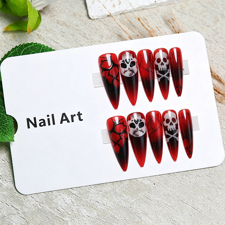 Creative Halloween Nail Art with Spider Web and Skull Designs Stornfield