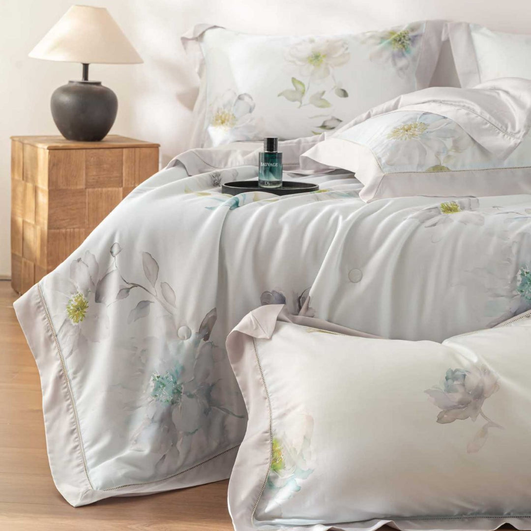 Luxurious cotton satin bedding set with delicate leaf design and hem detail