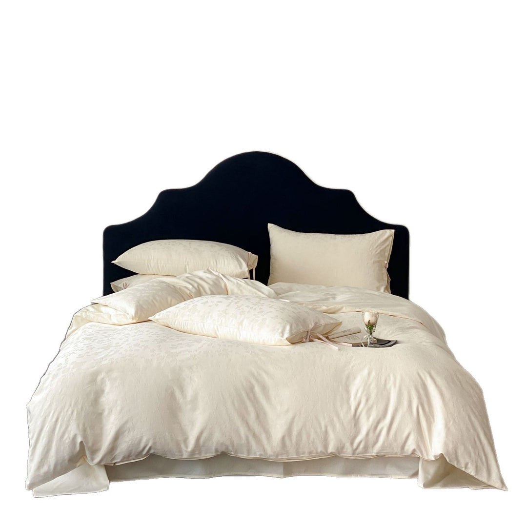Jacquard bedding set with bow closure and fine floral texture